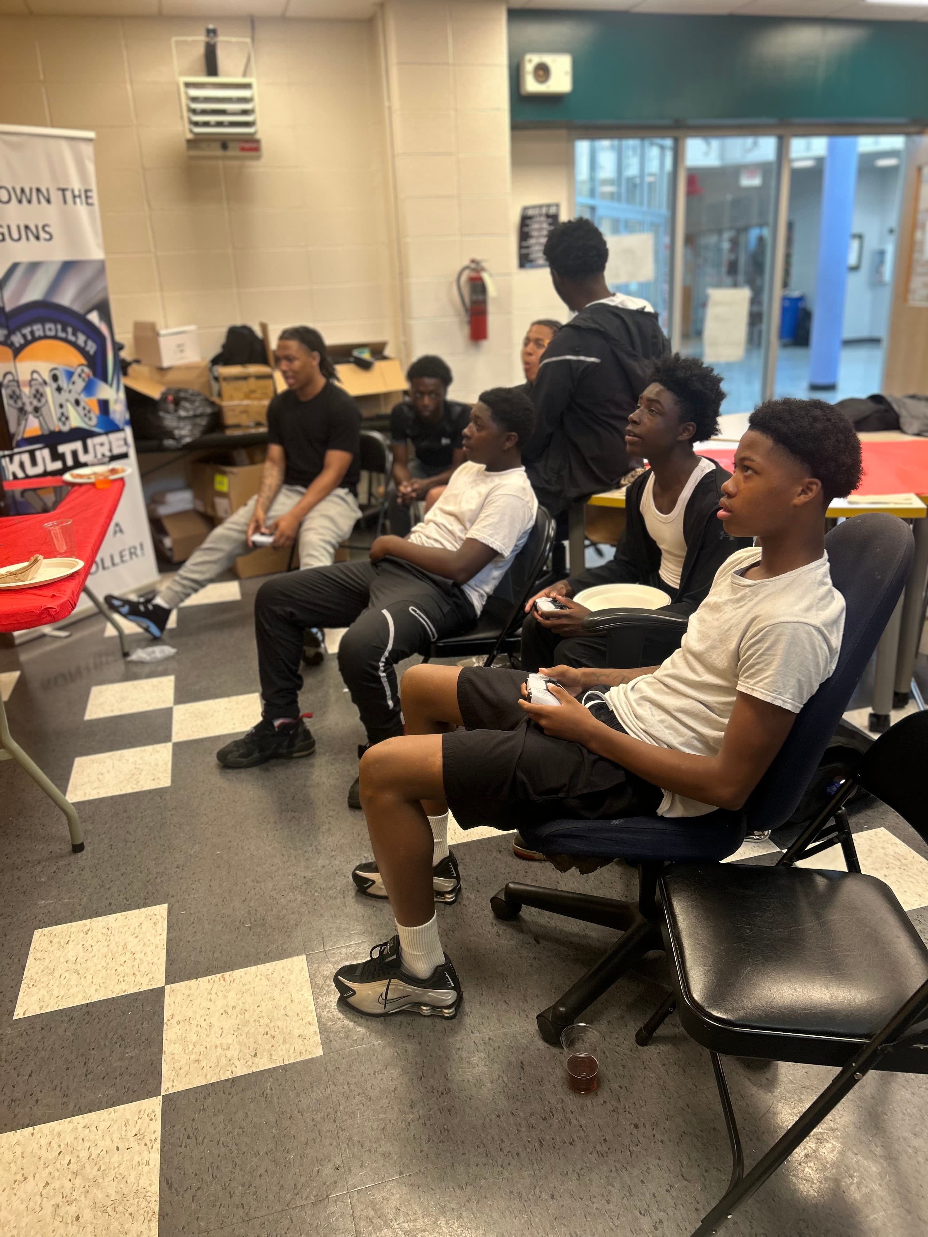 Youth engaged in competitive gaming