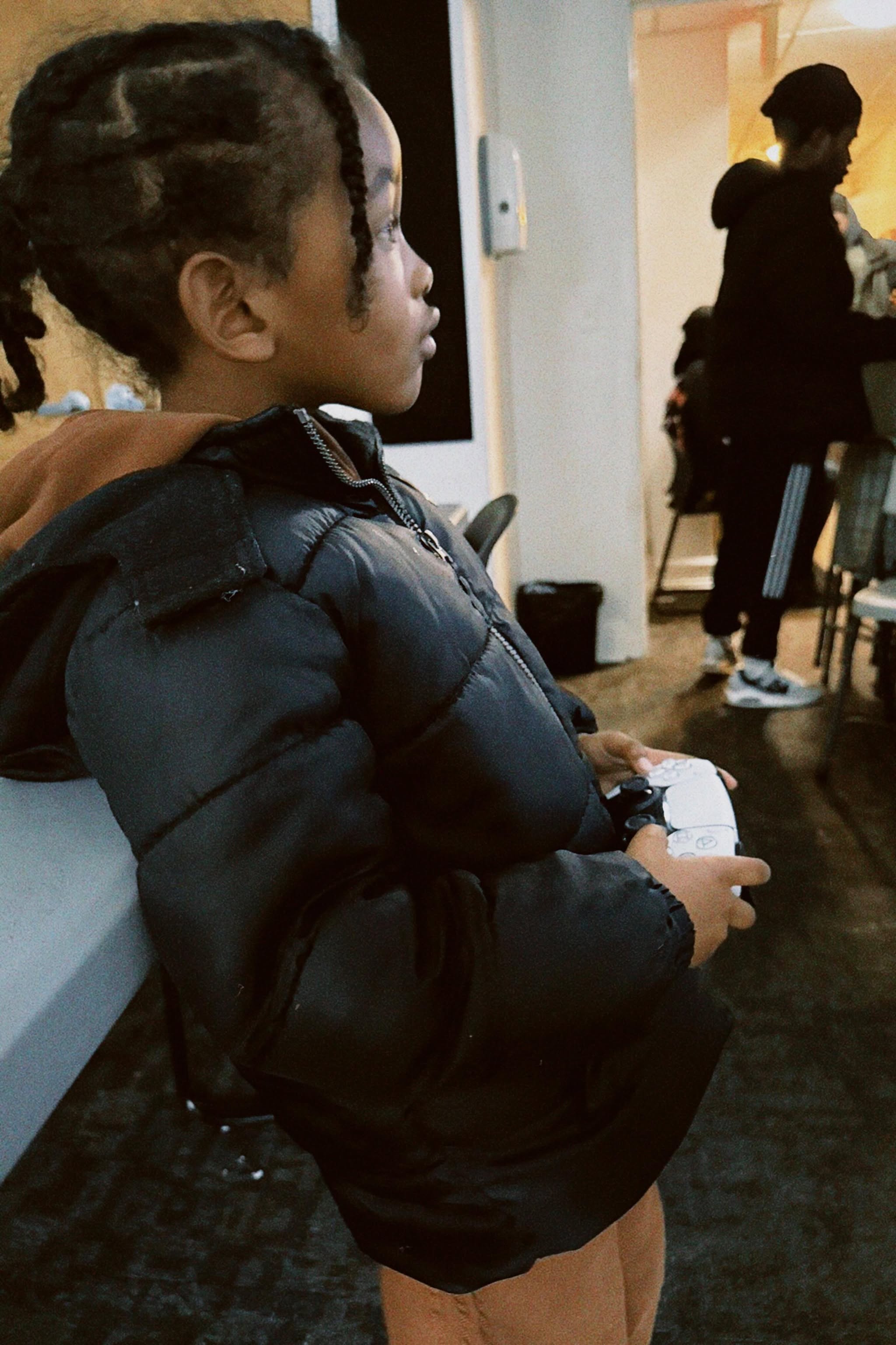 Youth engaged in gaming at Kontroller Kulture